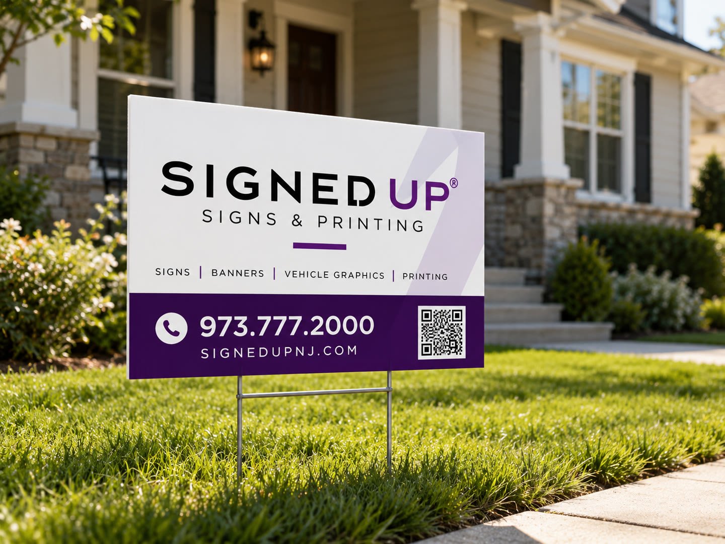 Signed Up corrugated plastic yard sign on a wire H-stake in a front lawn